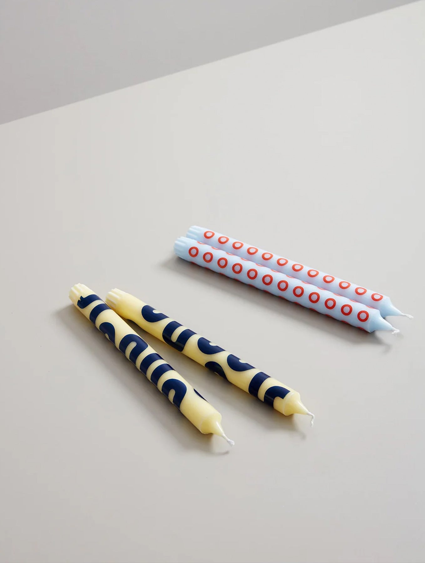 Gemusterte Kerzen - Gelb/Blau- 4er-Set